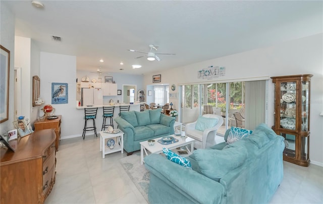 living room featuring ceiling fan