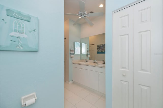 bathroom featuring vanity, tile patterned floors, and ceiling fan