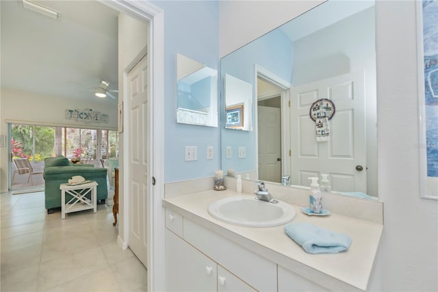 bathroom with ceiling fan, vanity, and tile patterned floors