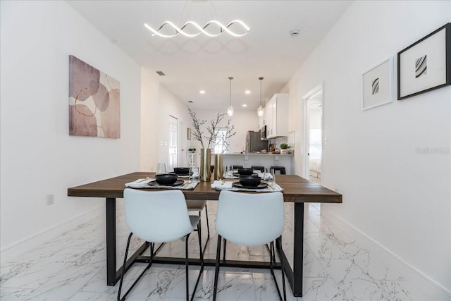 dining room with plenty of natural light