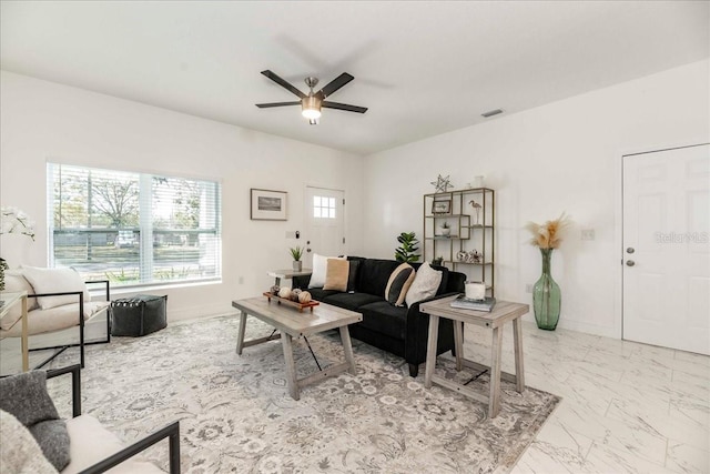 living room with ceiling fan