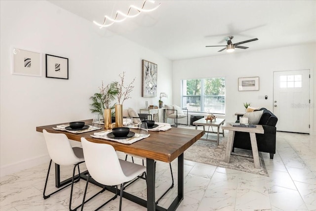 dining area with ceiling fan