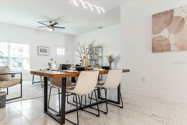 dining room with ceiling fan