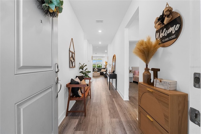 hallway featuring light hardwood / wood-style floors