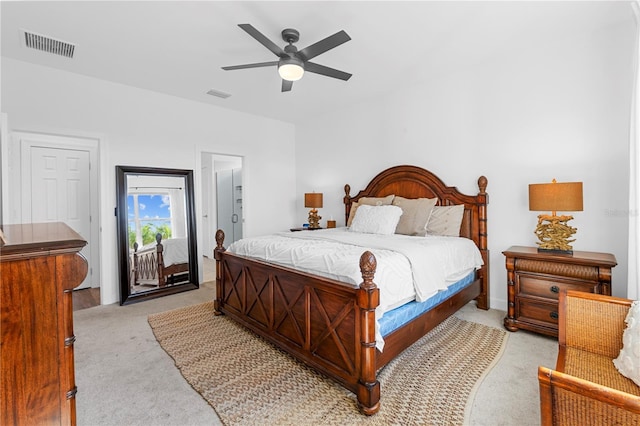 bedroom featuring ceiling fan and light colored carpet