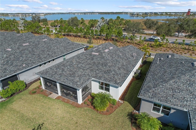 drone / aerial view with a water view