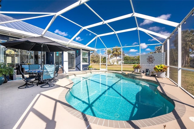 outdoor pool featuring a patio and a lanai