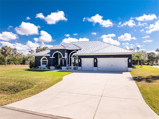 view of front facade with a garage, a front yard, a standing seam roof, and metal roof