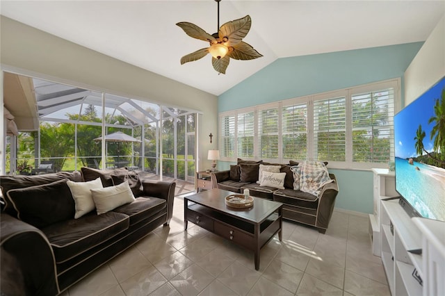 sunroom / solarium with ceiling fan, plenty of natural light, and lofted ceiling