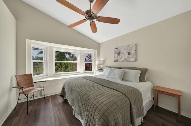 bedroom with lofted ceiling, dark hardwood / wood-style flooring, and ceiling fan