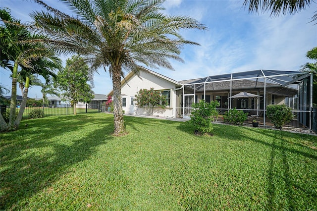 view of yard featuring a lanai