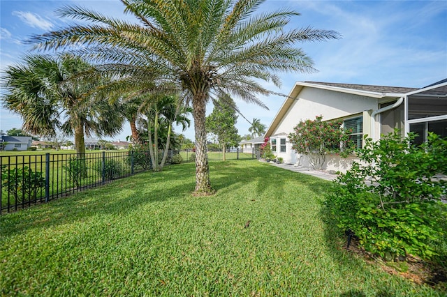 view of yard featuring a lanai