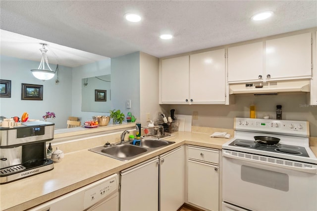 kitchen featuring white cabinetry, sink, hanging light fixtures, white appliances, and a textured ceiling