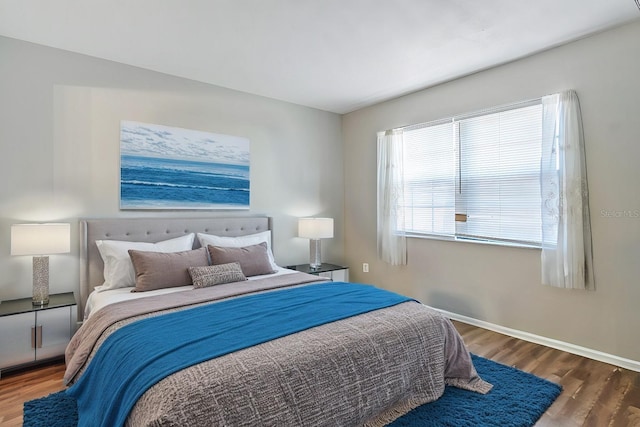 bedroom featuring dark hardwood / wood-style floors