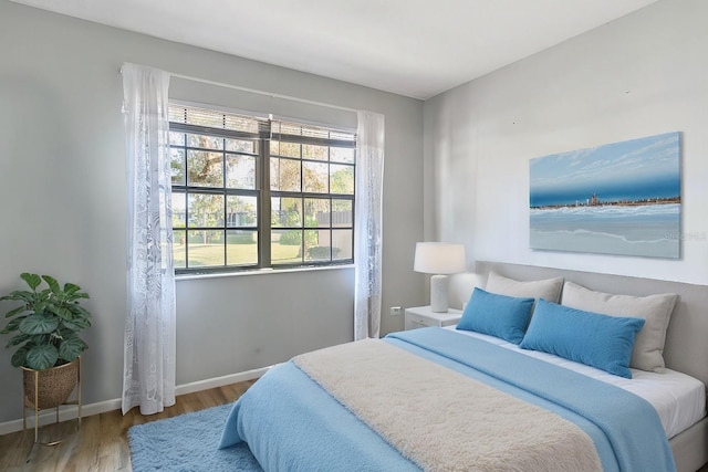 bedroom featuring hardwood / wood-style floors