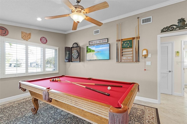 playroom with pool table, crown molding, tile patterned floors, and ceiling fan