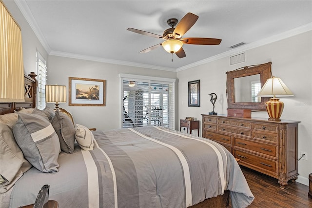 bedroom featuring ornamental molding, ceiling fan, and dark hardwood / wood-style flooring