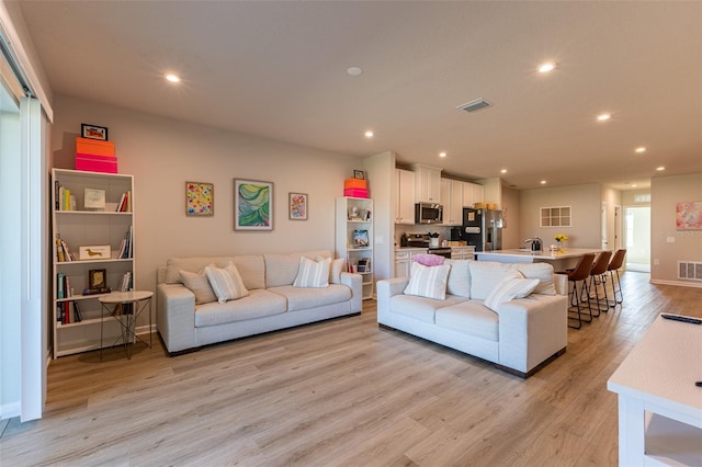 living room featuring light hardwood / wood-style flooring