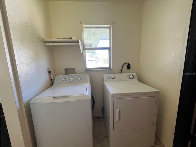 laundry area with separate washer and dryer