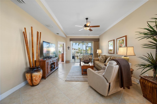 living room with light tile patterned flooring, ceiling fan, and ornamental molding