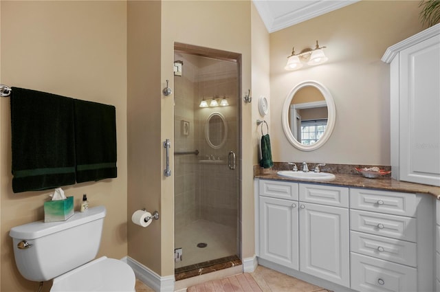 bathroom with crown molding, tile patterned flooring, an enclosed shower, vanity, and toilet