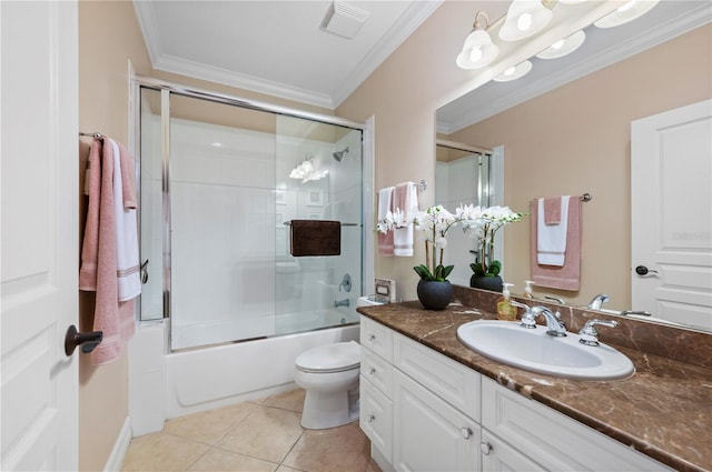 full bathroom with bath / shower combo with glass door, ornamental molding, vanity, toilet, and tile patterned floors