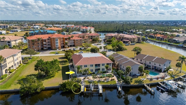 bird's eye view with a water view