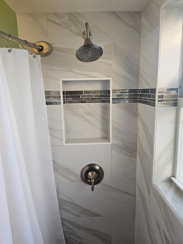 bathroom with curtained shower