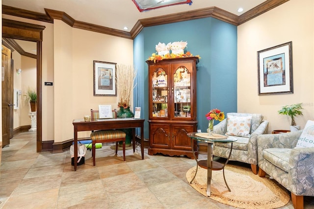 sitting room featuring ornamental molding