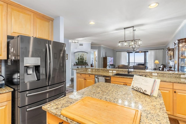 kitchen with crown molding, light brown cabinets, appliances with stainless steel finishes, kitchen peninsula, and light stone countertops