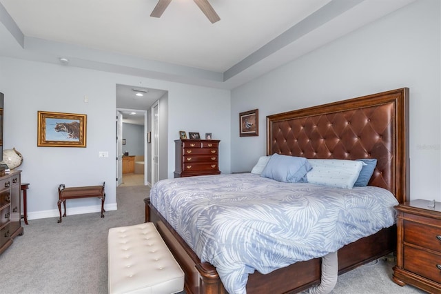 bedroom featuring light colored carpet and ceiling fan