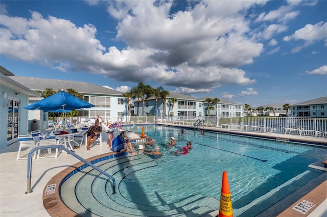 view of pool featuring a patio