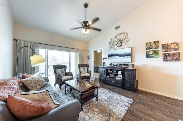 living room with ceiling fan and high vaulted ceiling