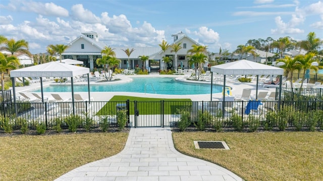 view of swimming pool with a lawn, a patio, and a gazebo