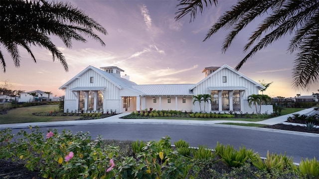 view of outdoor building at dusk