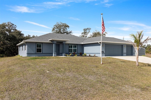 ranch-style home featuring a garage and a front lawn