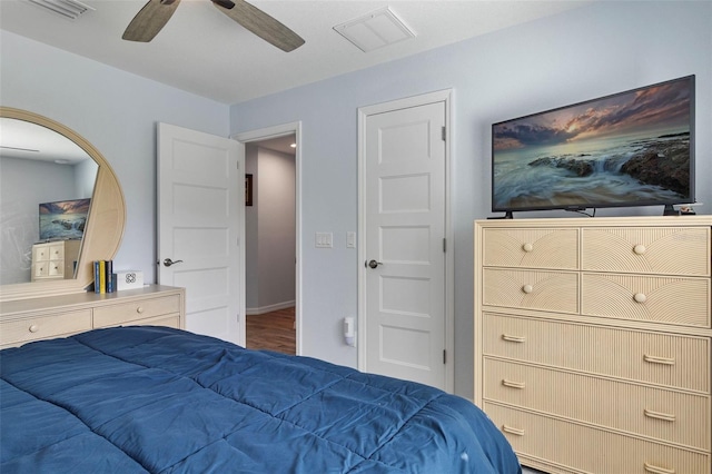 bedroom featuring hardwood / wood-style flooring and ceiling fan