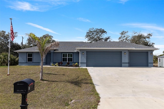 ranch-style home featuring a garage and a front yard