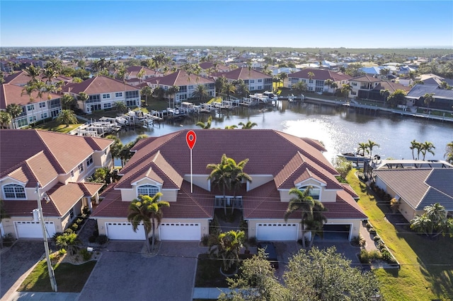 bird's eye view with a water view