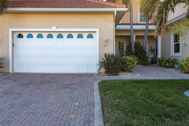 garage featuring a yard