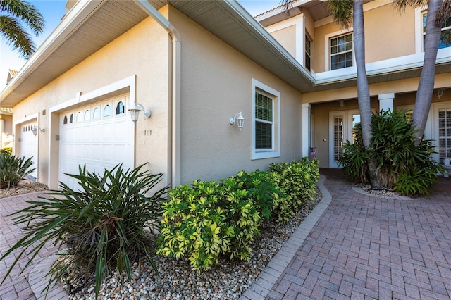 exterior space with a garage