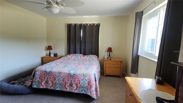 bedroom featuring ceiling fan and carpet flooring