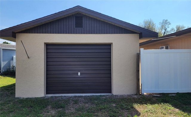 garage with a yard