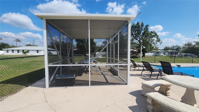 view of patio / terrace with a lanai and a fenced in pool