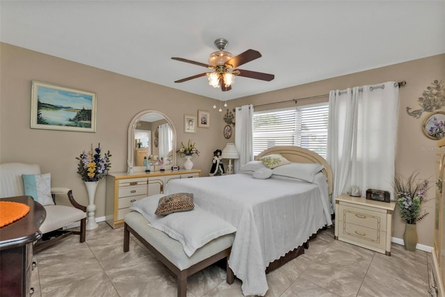 bedroom featuring ceiling fan