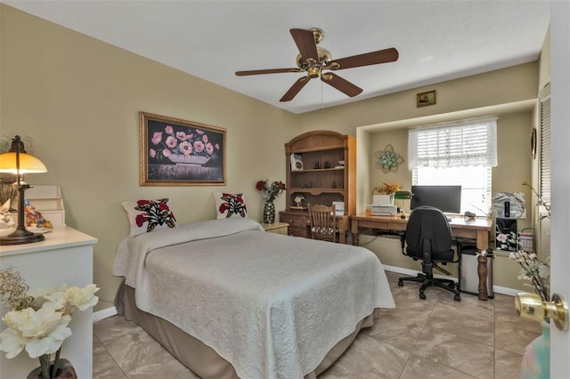 bedroom featuring ceiling fan