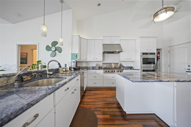 kitchen featuring stainless steel appliances, white cabinetry, and high vaulted ceiling