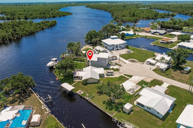 bird's eye view with a water view