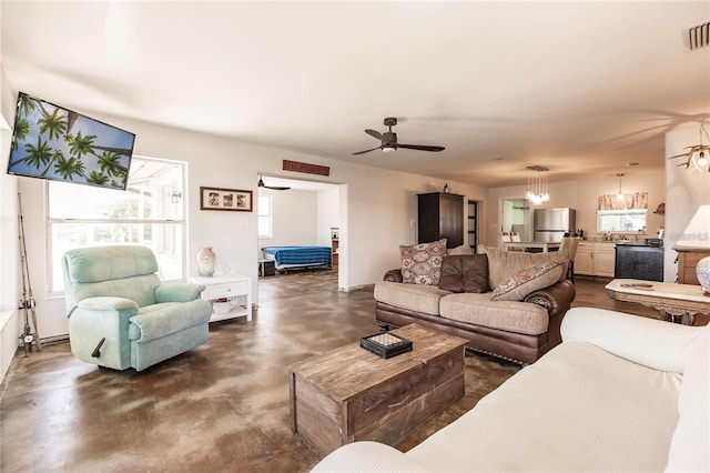 living room featuring ceiling fan