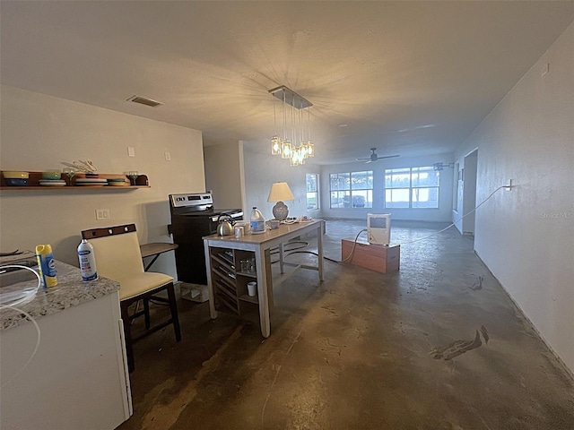 9656 SW Marina Dr, Arcadia, FL 34269 - home office featuring concrete flooring and ceiling fan